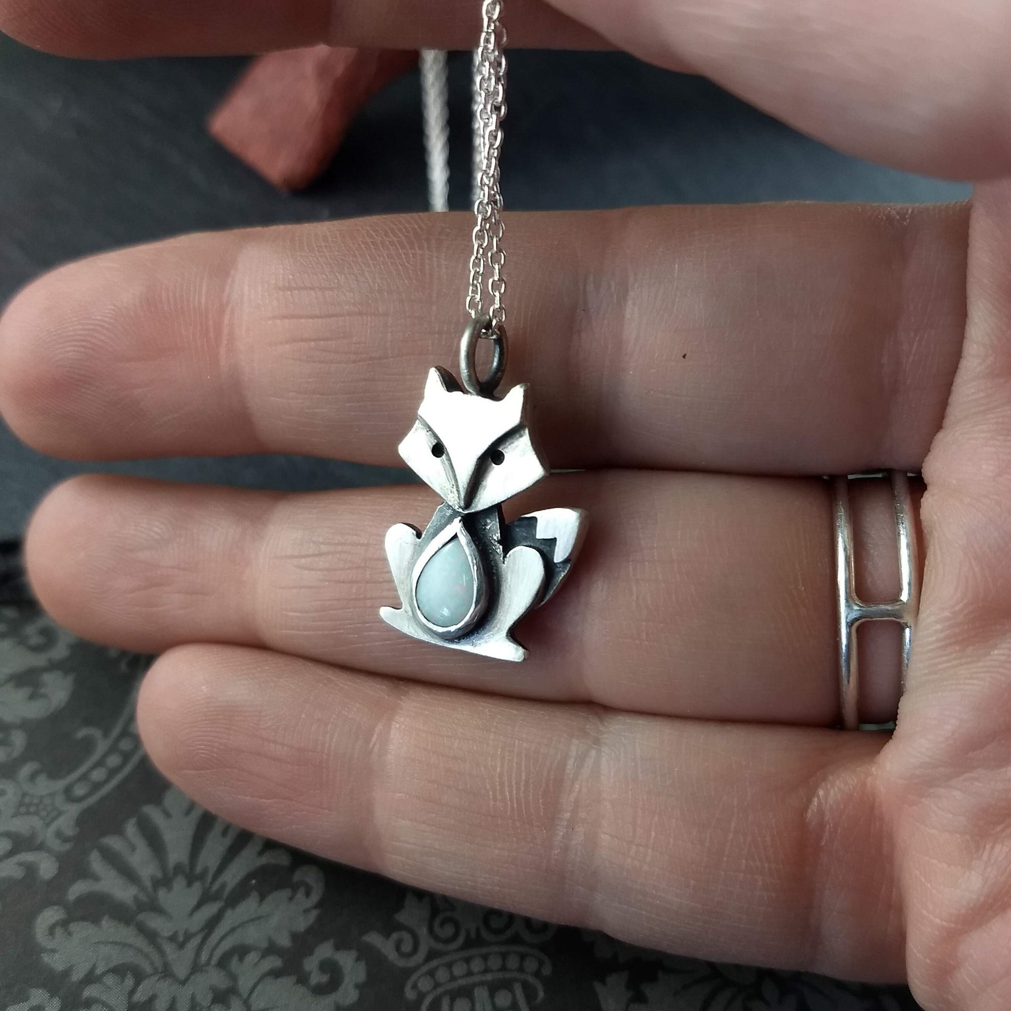 Sterling silver fox pendant with fine stone